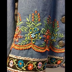 Brightly beaded and embroidered denim jean jacket.